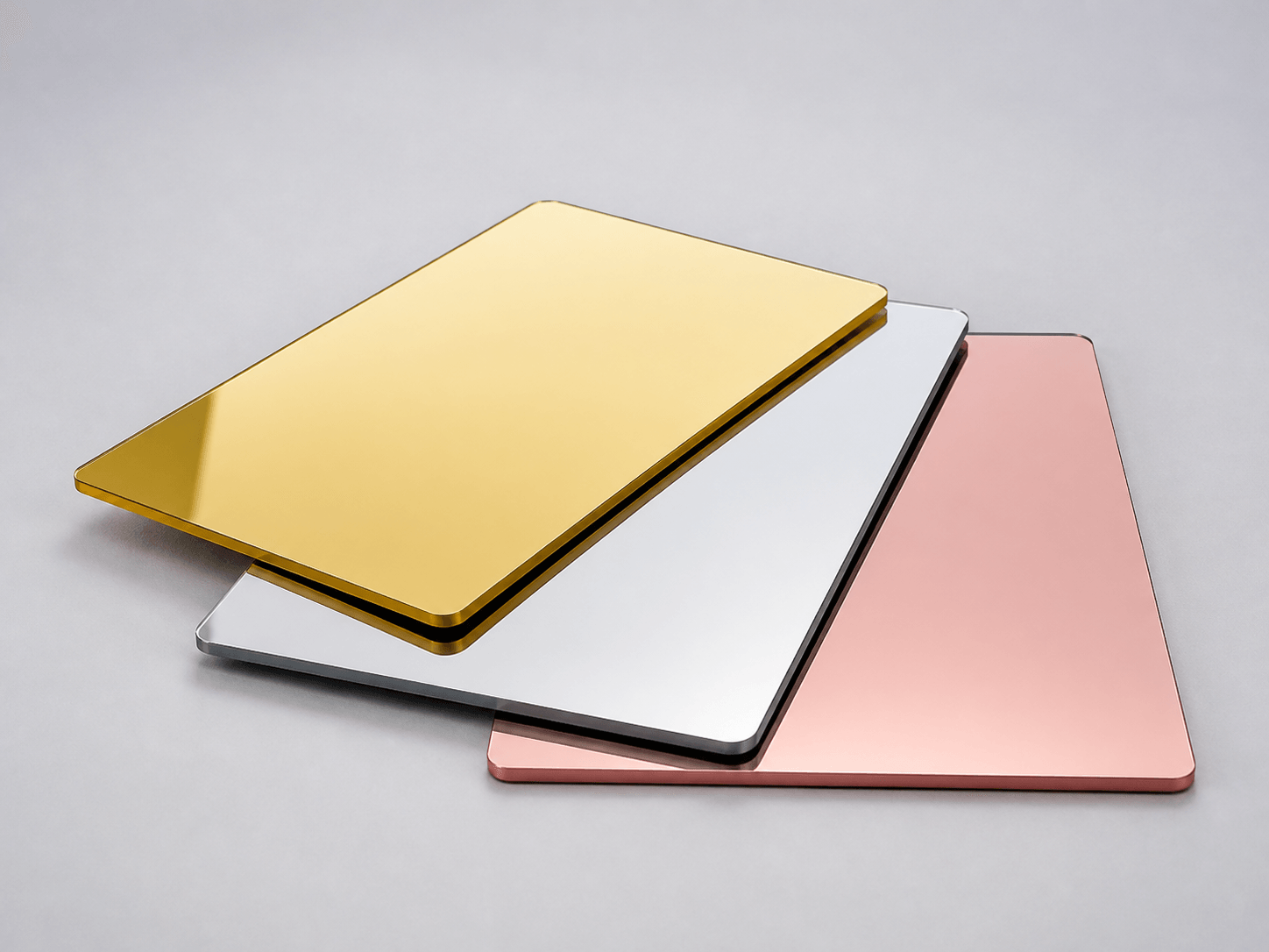 Gold, silver, and rose-gold acrylic mirror sheets for reflective signage and displays